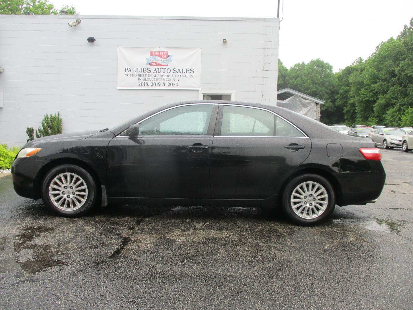 2007 BLACK Toyota Camry LE V6 (4T1BK46KX7U) with an 3.5L V6 DOHC 24V engine, 6-Speed Automatic Overdrive transmission, located at 540a Delsea Drive, Sewell, NJ, 08080, (856) 589-6888, 39.752560, -75.111206 - Photo#2